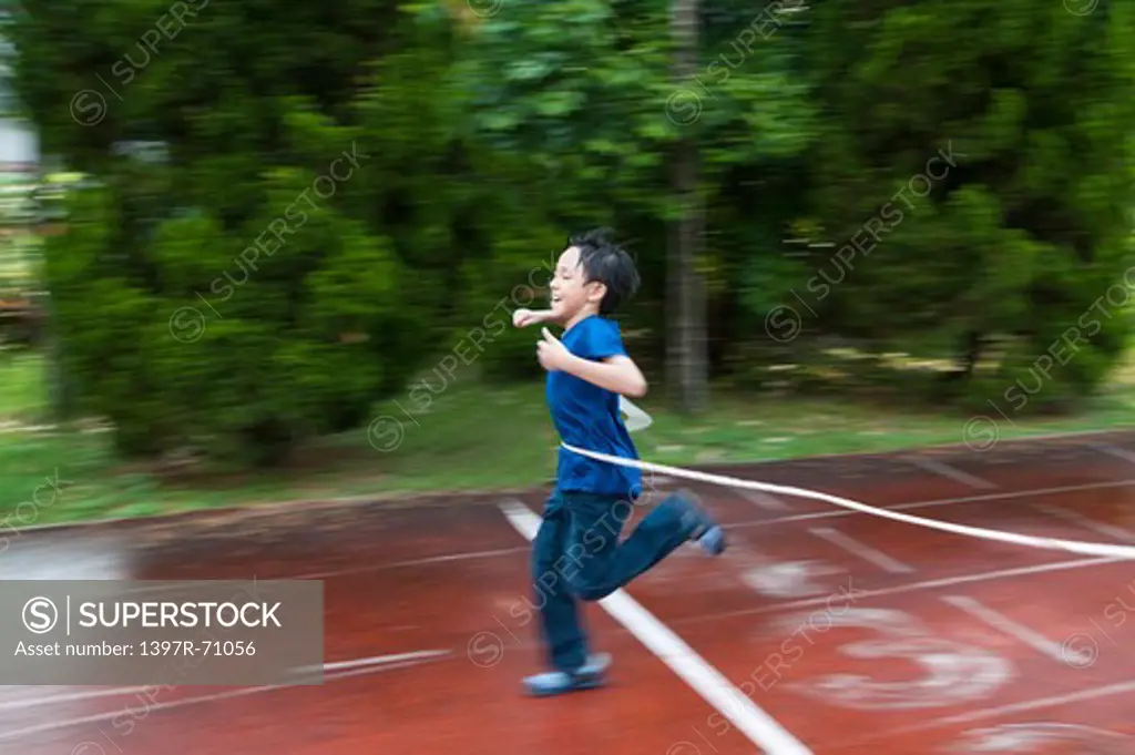 Boy winning a race