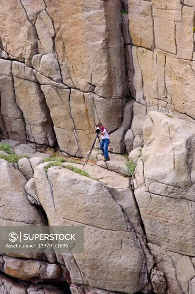 Photographer taking pictures on the cliff, Photographing, Leisure Activity