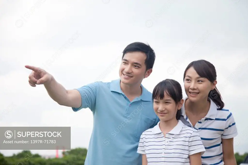 Mid adult couple with their daughter