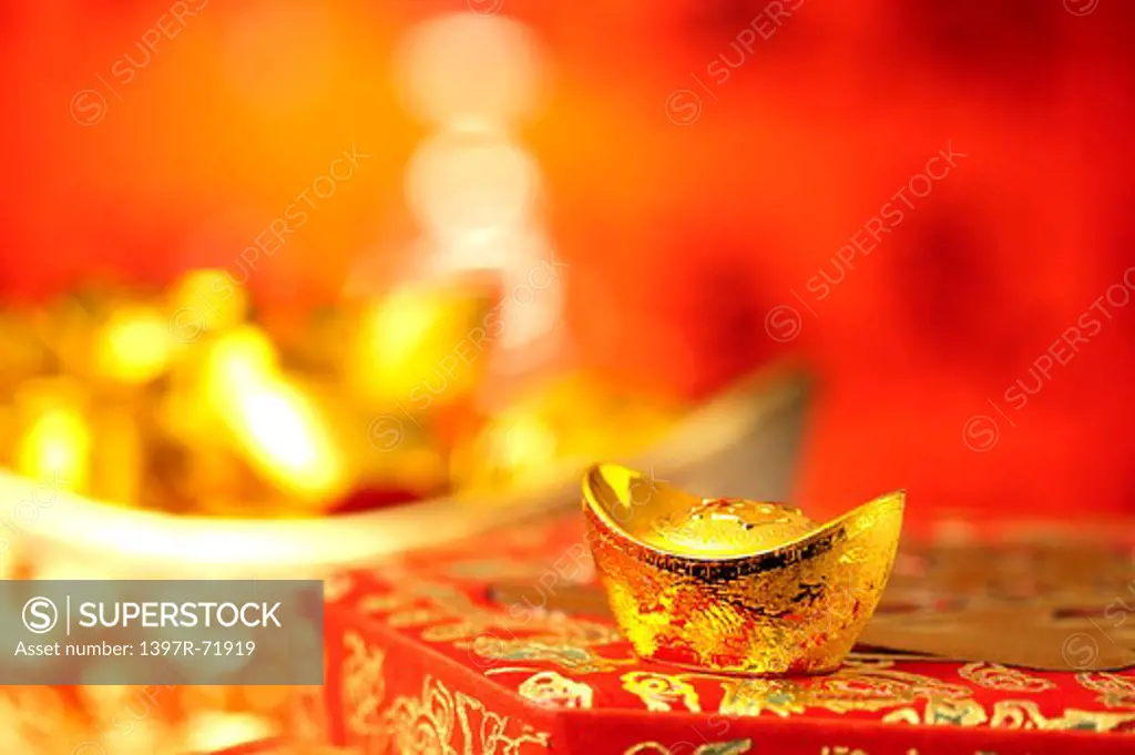Gold ingot symbolizing wealth