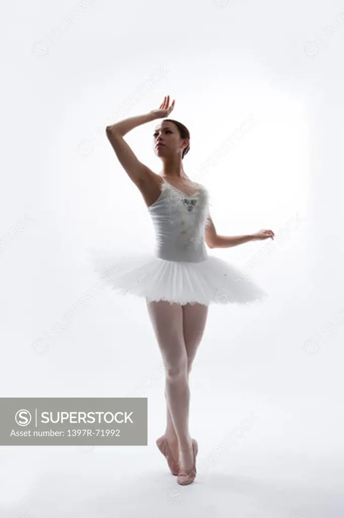 Ballet dancer dancing and looking away
