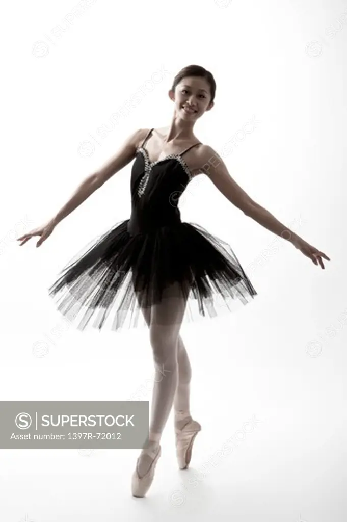 Ballet dancer dancing and smiling