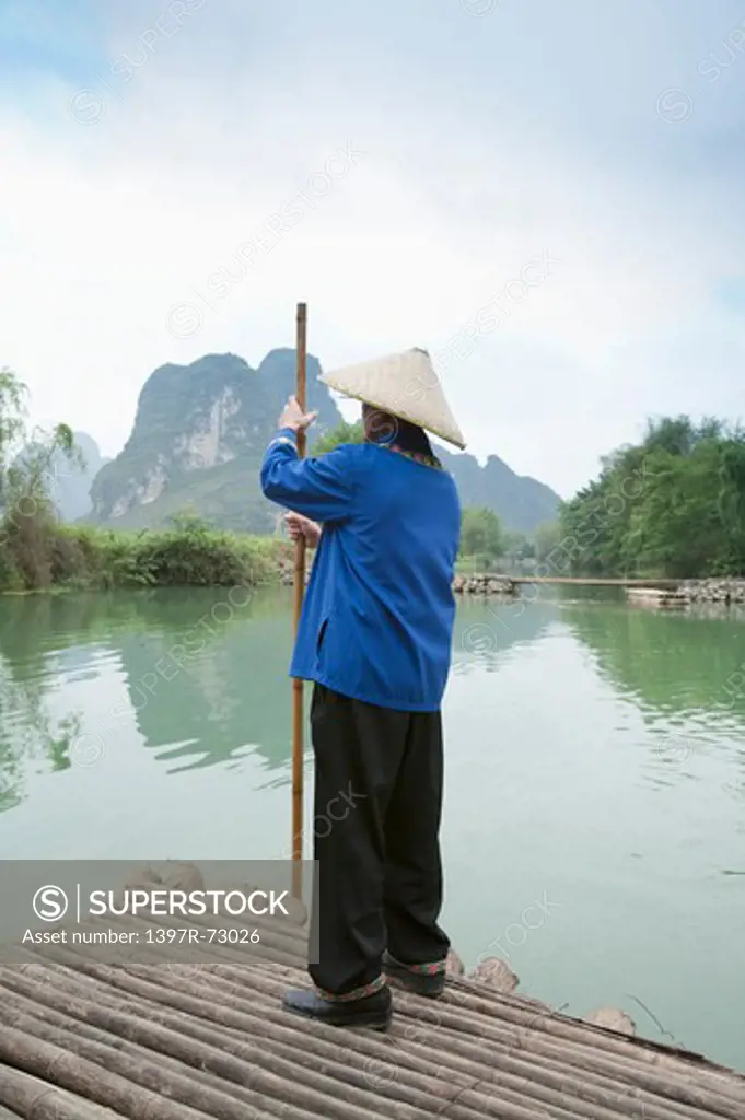 Mingshi Pastoral Scenery, A Fisherman of Zhuang People, Guangxi Province, China