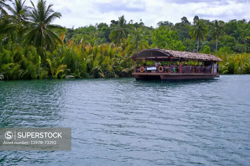 Bohol Island, Cebu, Philippines, Asia, A tourboat on the river