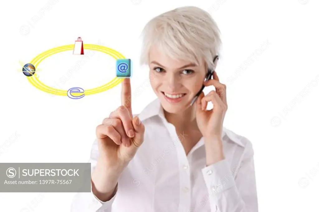 Young woman touching and wearing hands-free device with smile