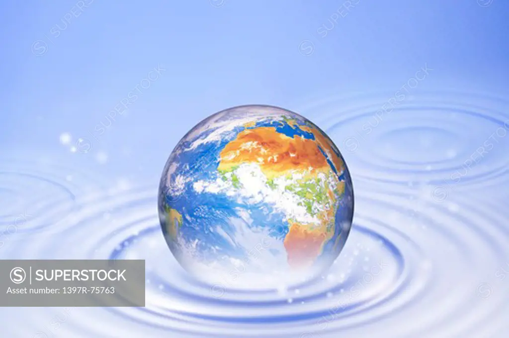 Environmental Conservation, Digitally generated image of the earth on the rippled water