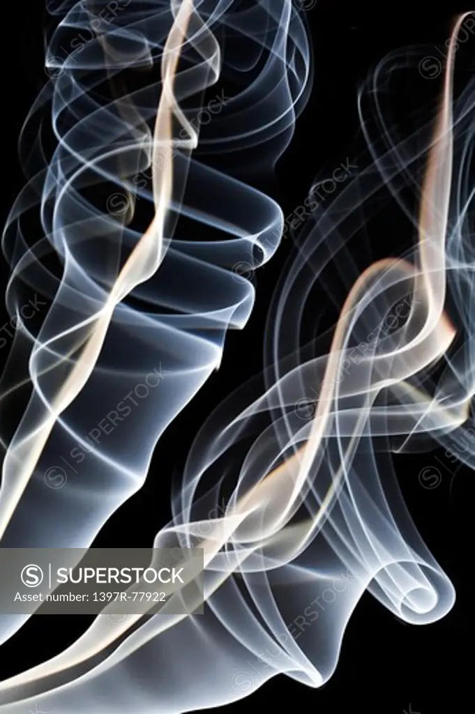 Ethereal drift of smoke on black background
