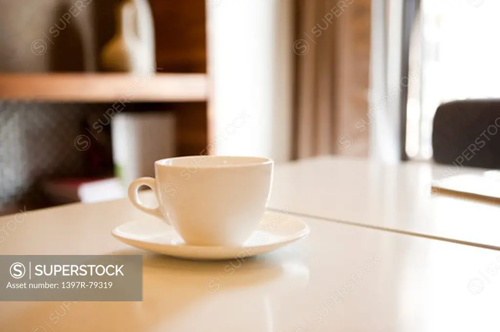 Close-up of coffee cup on the table