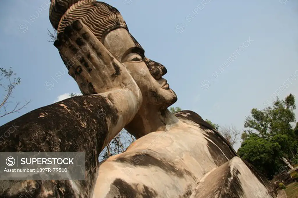 Reclining Buddha on ventiane buddha park,Laos,Asia