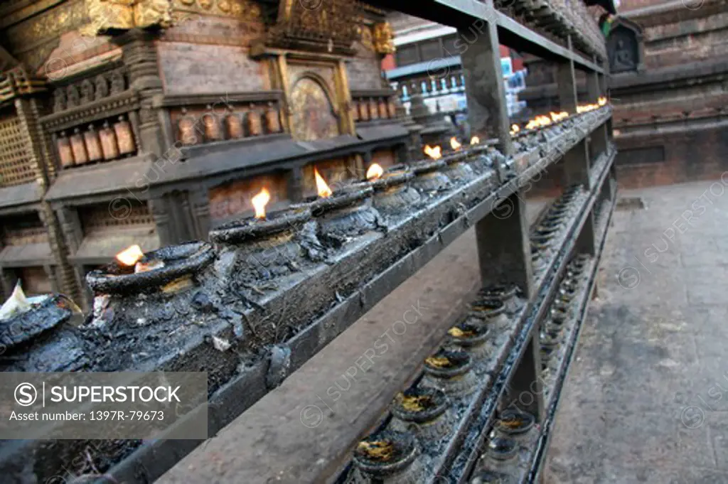 Line of candels in the Swayambhunath temple,Nepal,Asia