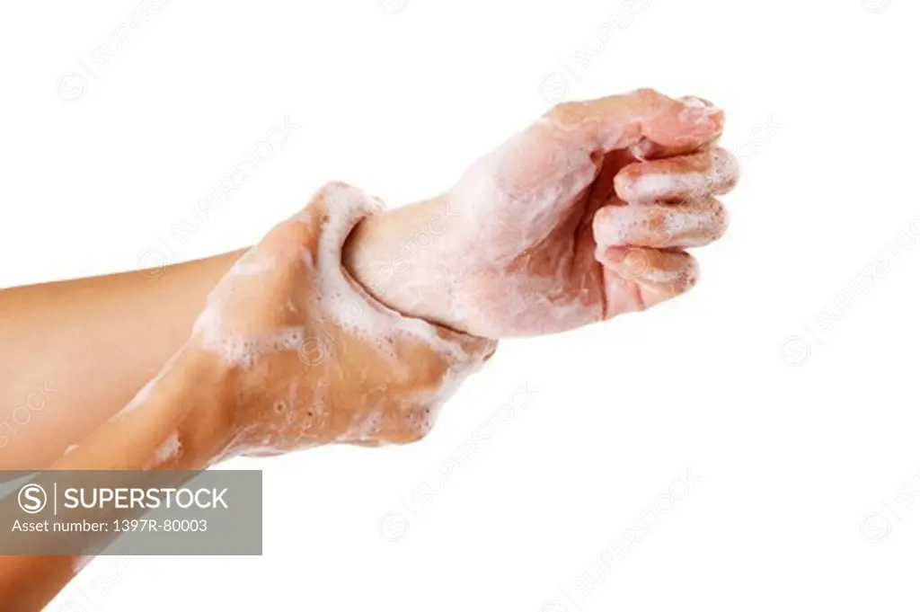 Close-up of human hands washing