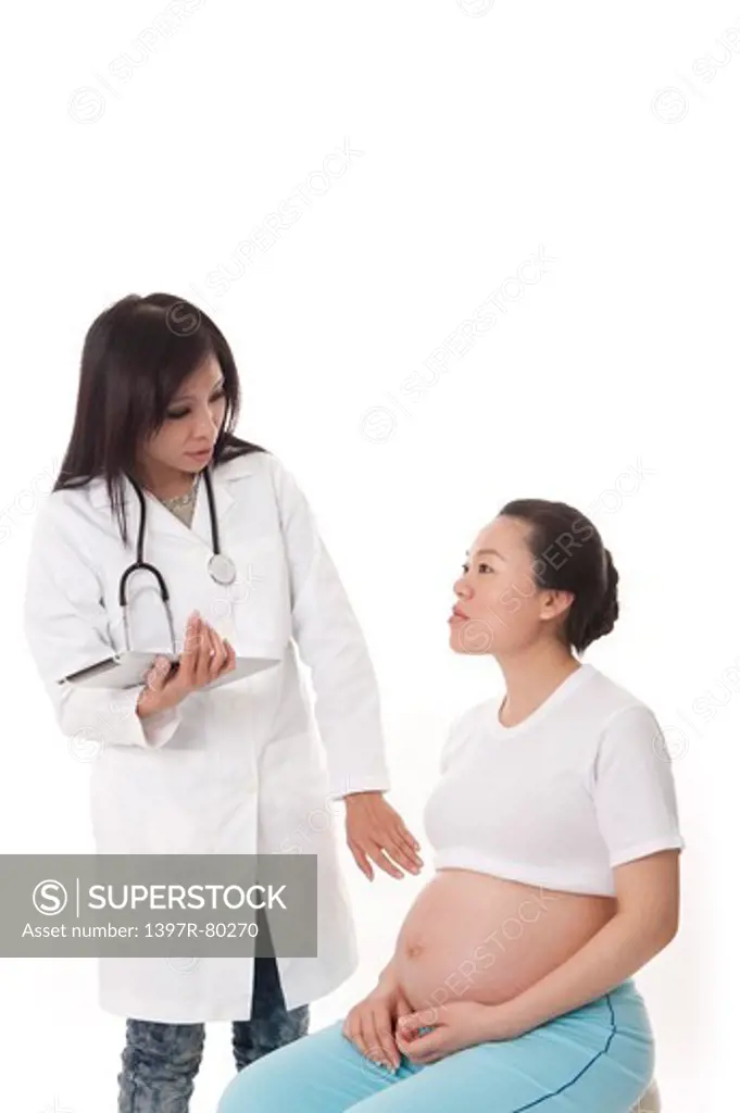 Pregnant woman seeing the doctor