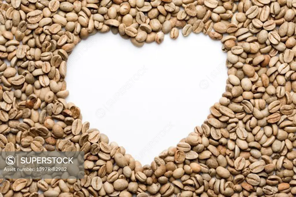 Close-up of coffee beans with heart shape