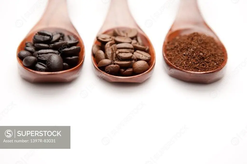 Close-up of coffee beans and ground coffee