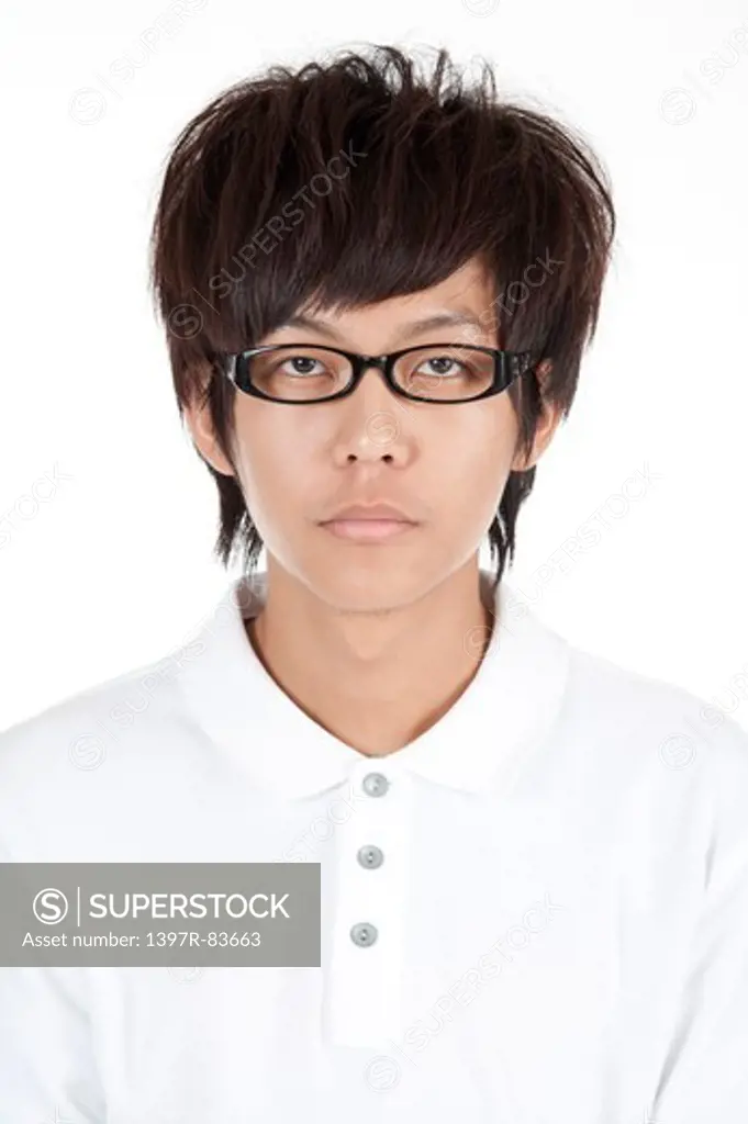 Portrait of a teenage boy wearing glasses