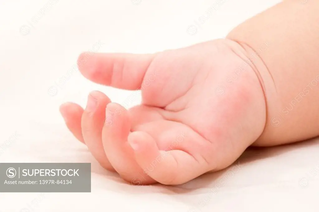 Close-up of a baby girl's hand