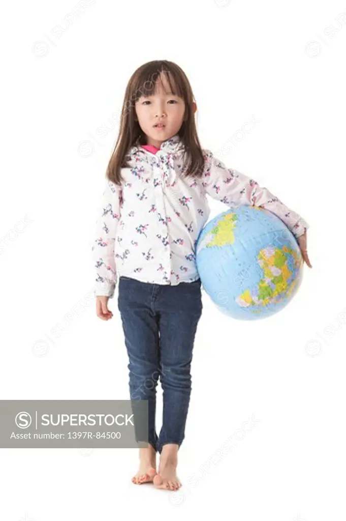 Girl holding an inflatable globe