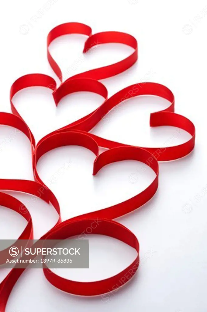 Red ribbons in heart shape