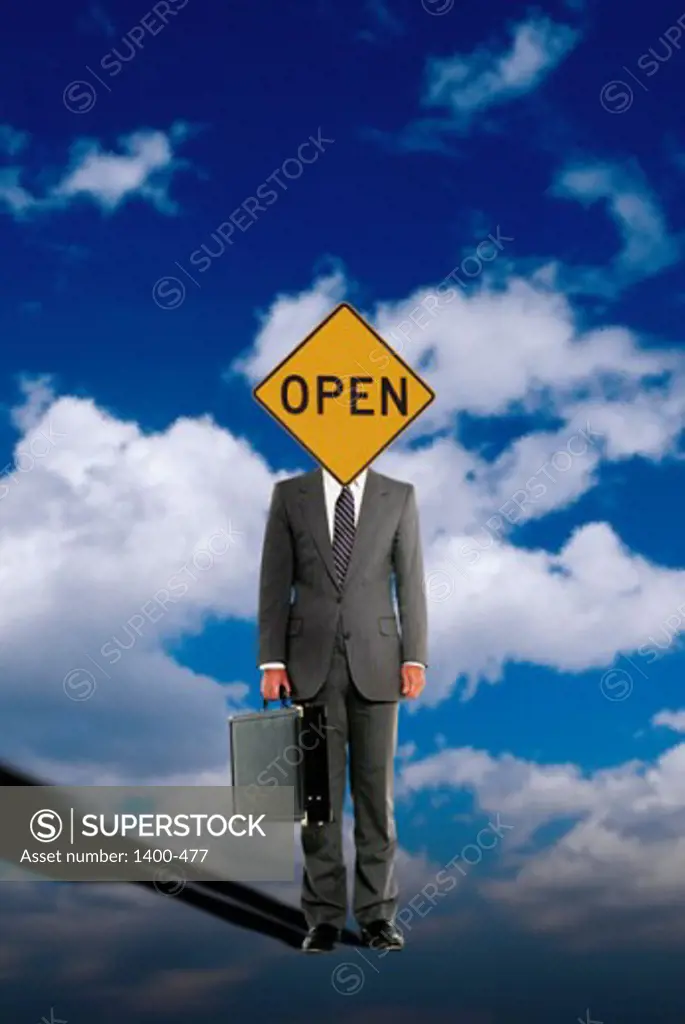 Businessman standing with an open sign in place of his face