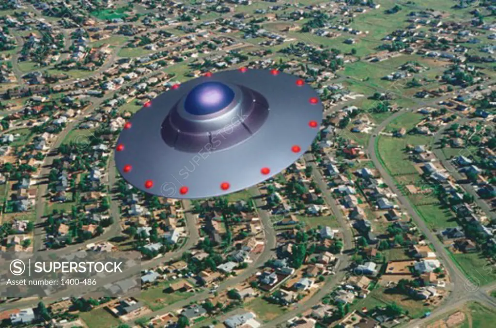 High angle view of a flying saucer over a city