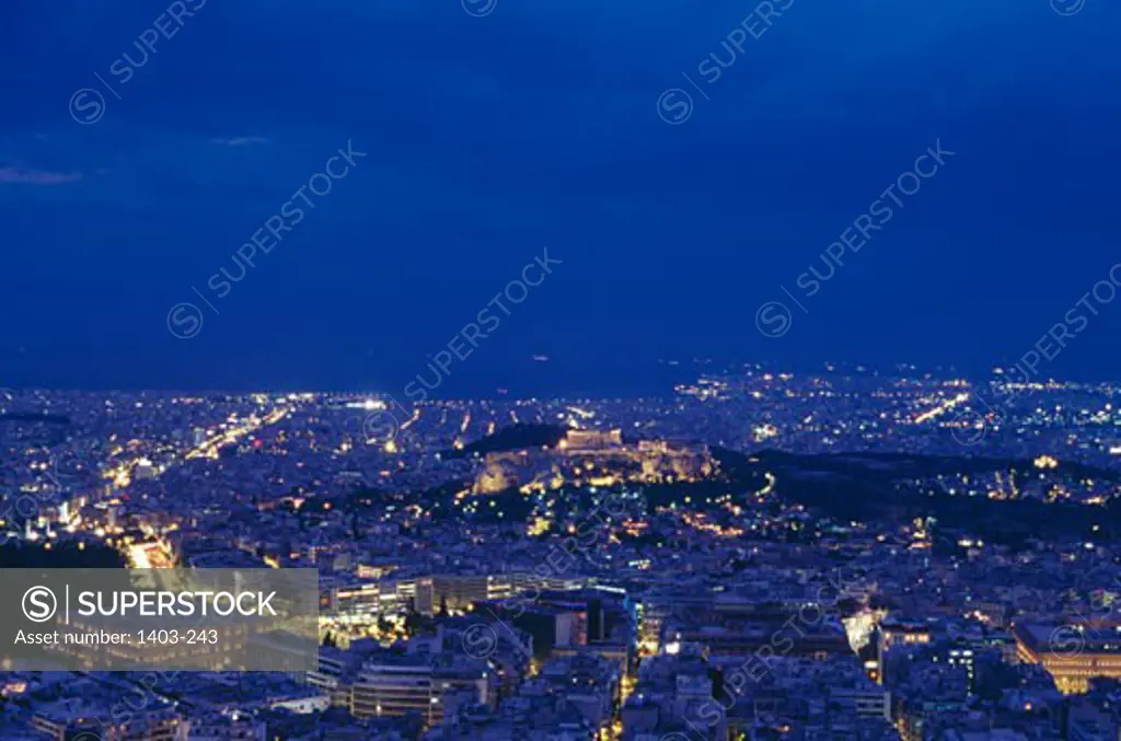 Greece, Athens, Acropolis, City lit up at dusk