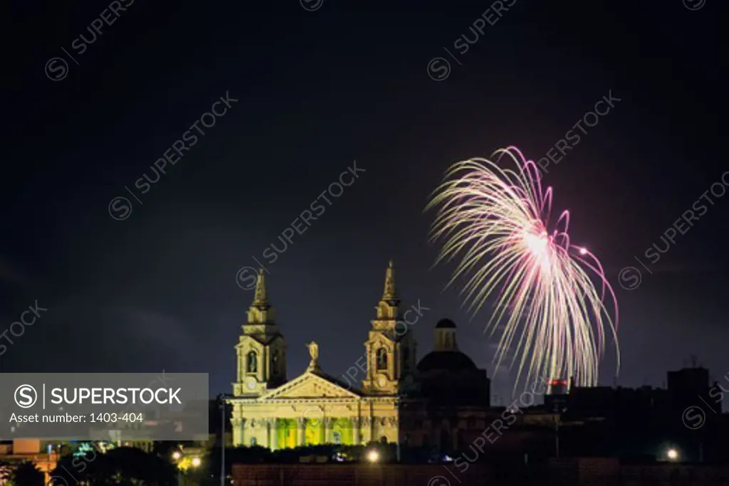 Fire works light up the night sky, St. Publius, Malta