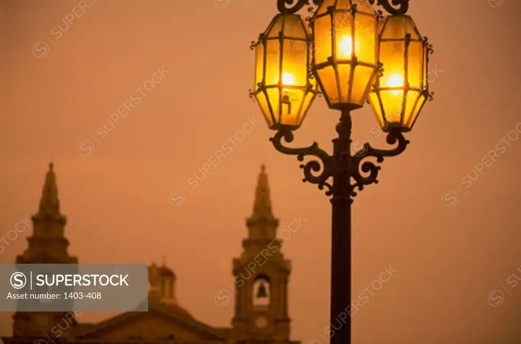 Street lamps lit up at St. Publius, Malta