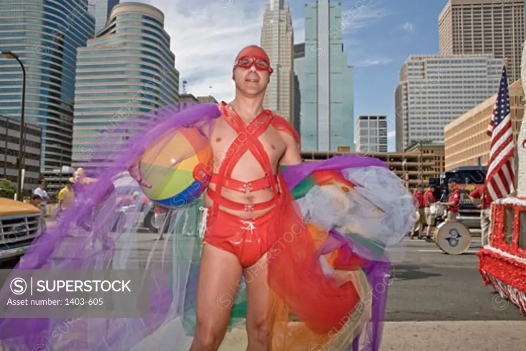 Gay man in female clothing participating in a gay pride parade, Minneapolis, Minnesota, USA