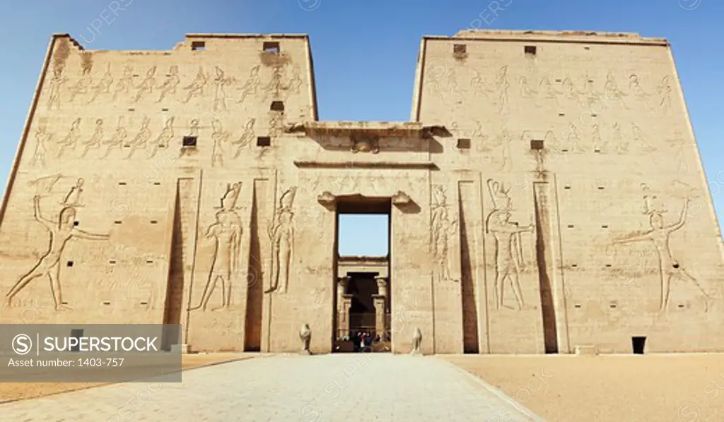 Egypt, Edfu, Carved pylon entrance to Temple of Horus