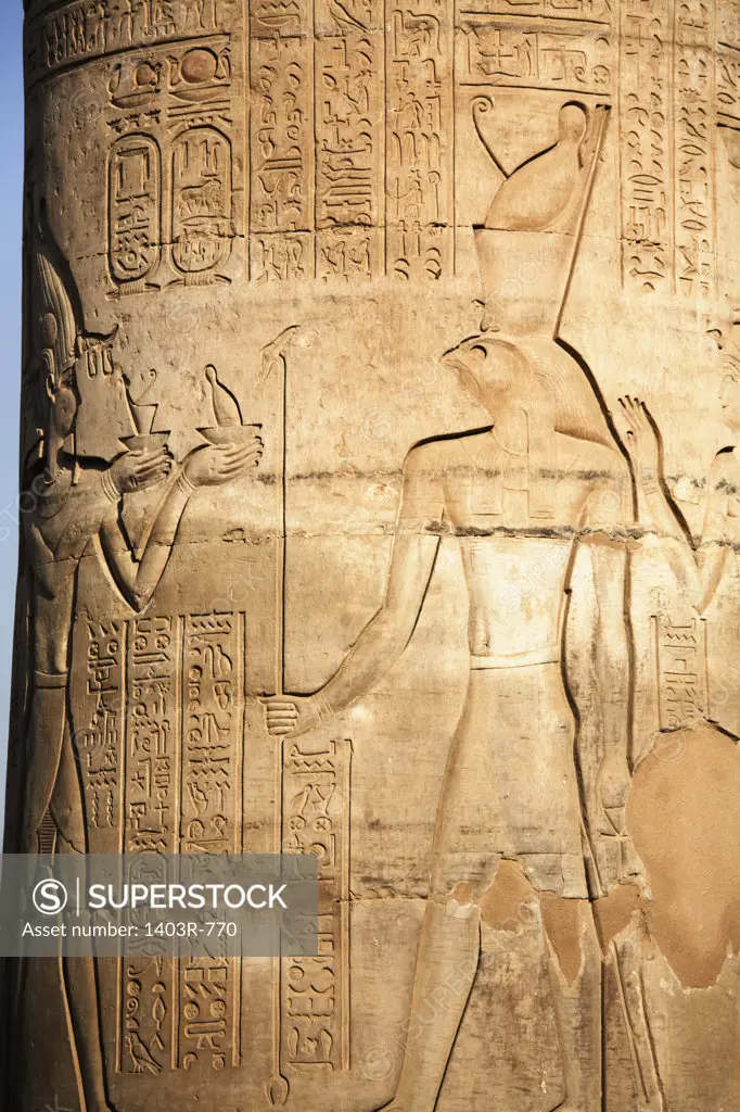 Egypt, Depiction of god Horus on column at ancient ruins of Kom Ombo on Nile River