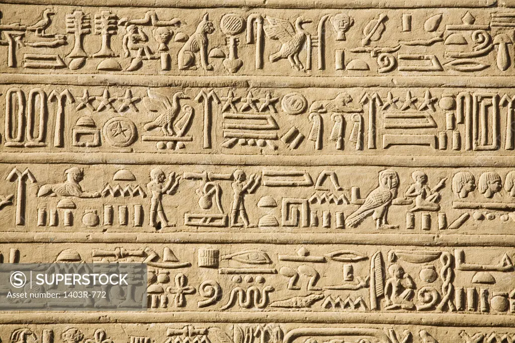 Egypt, Hieroglyphics carved into wall of Temple of Horus and Sobek at ancient ruins of Kom Ombo on Nile River