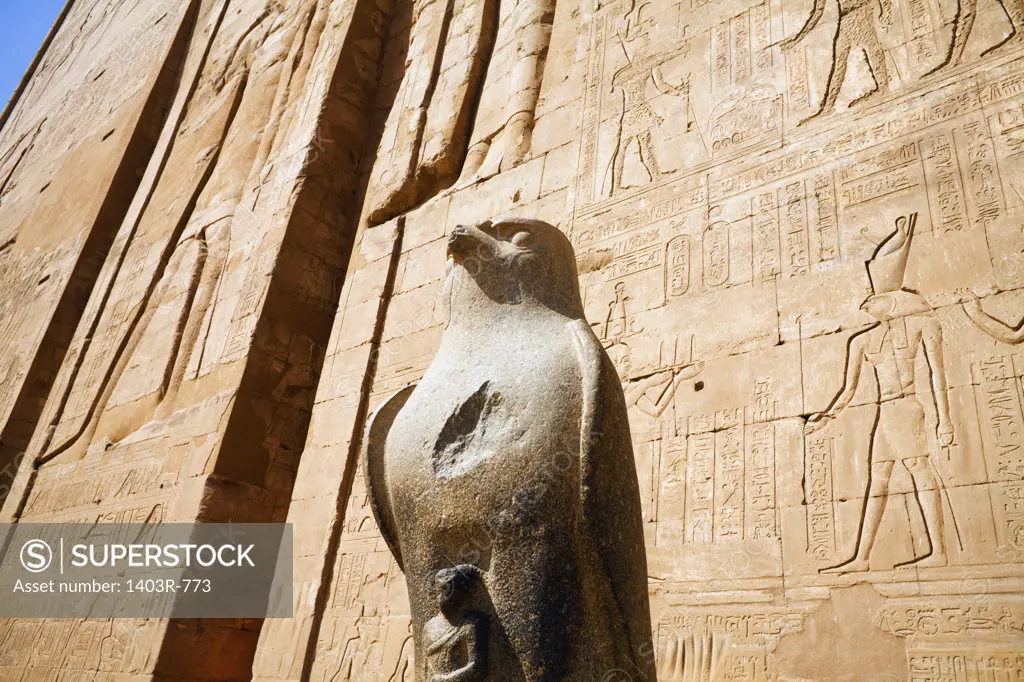 Egypt, Statue of Horus at First Pylon at ruins of Edfu