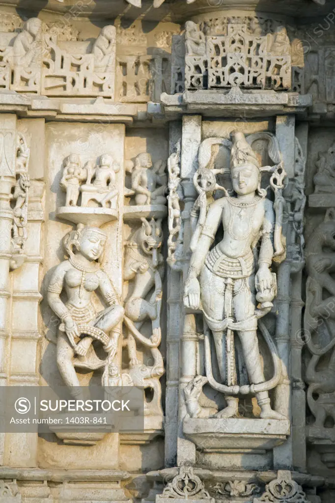 India, Rajasthan, Ranakpur, Suparshvanth Temple in complex of Jain Temples, Low angle view of carvings