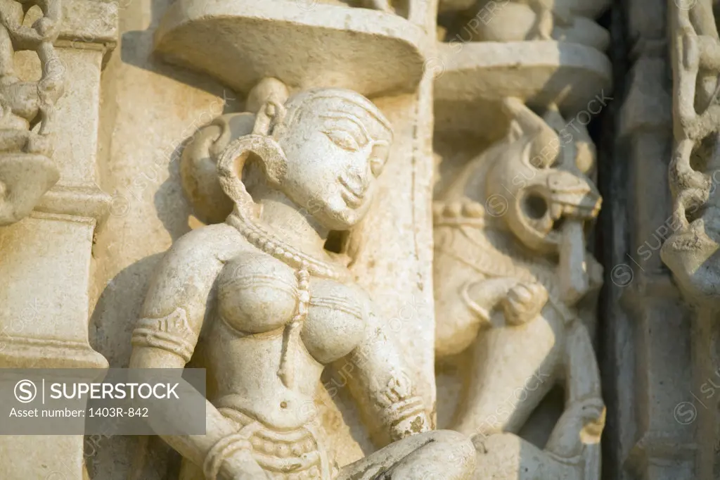 India, Rajasthan, Ranakpur, Detail of carving on one of Jain Temples, Close-up of carving