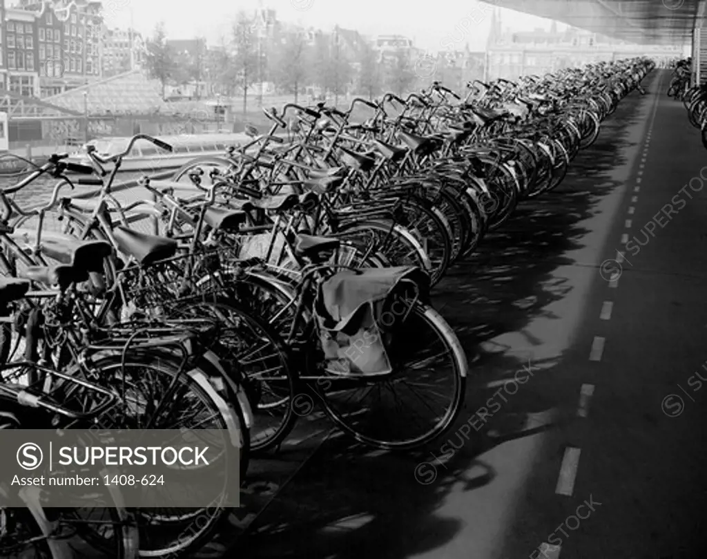 Bicycles parked in a row, Central Station, Amsterdam, Netherlands