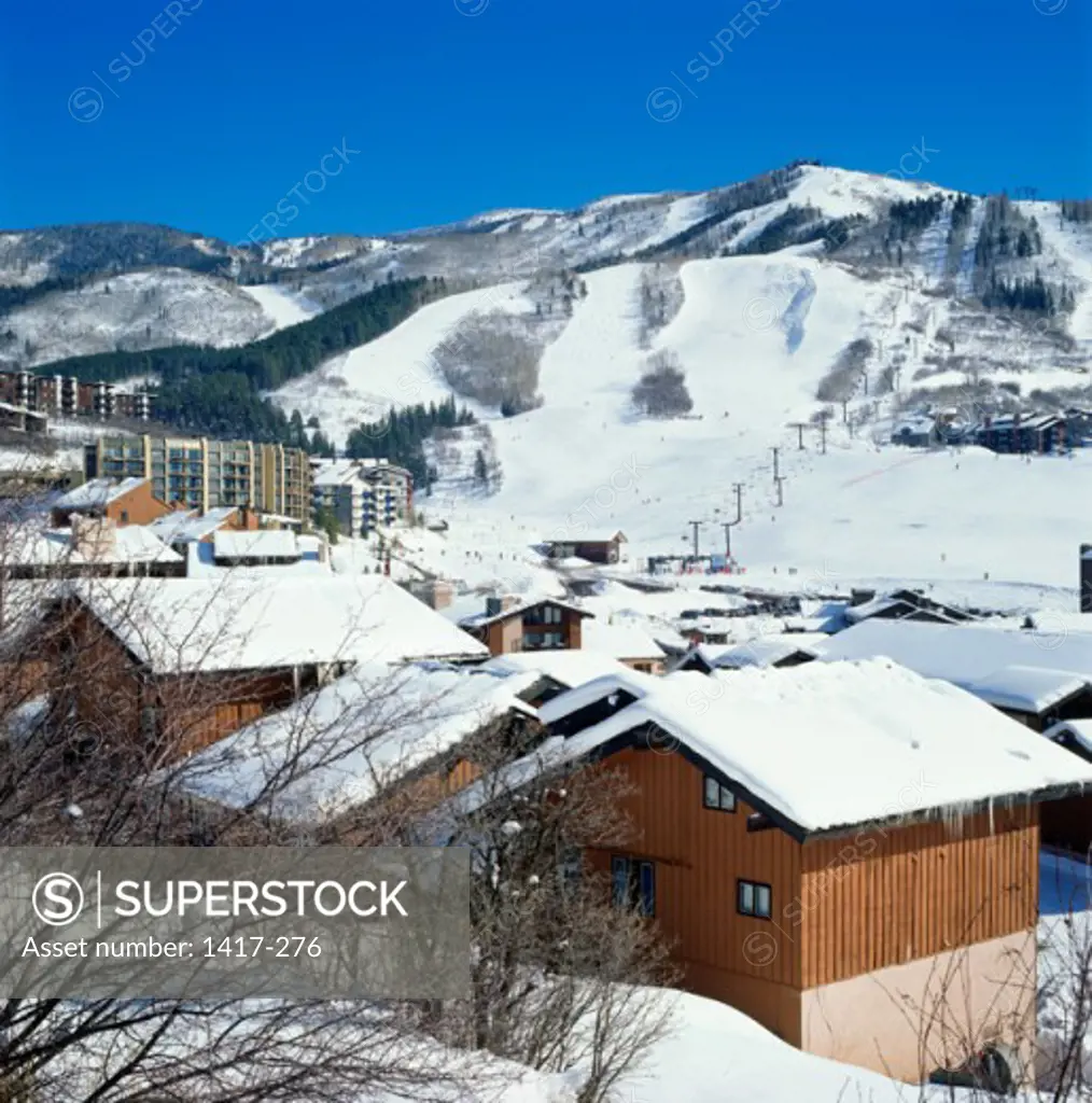 Buildings covered with snow, Steamboat Springs, Colorado, USA
