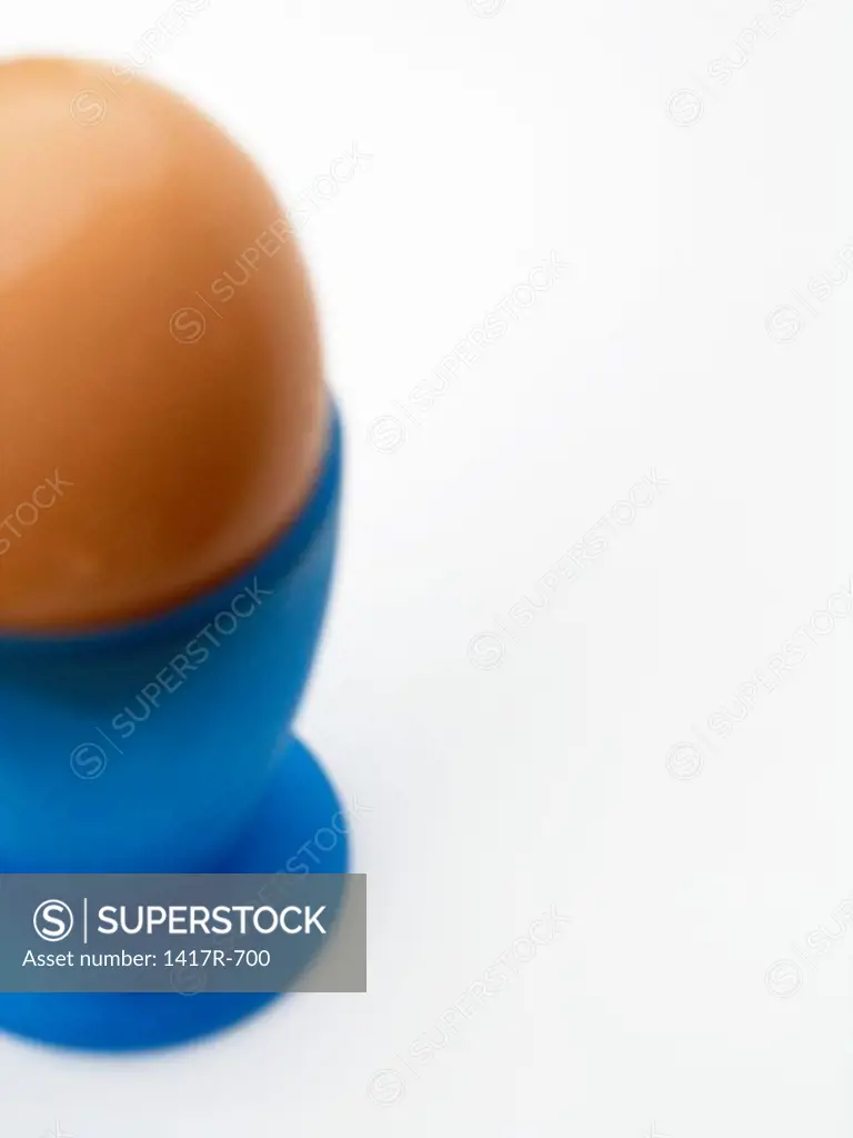 Close-up of a hard-boiled egg in an eggcup