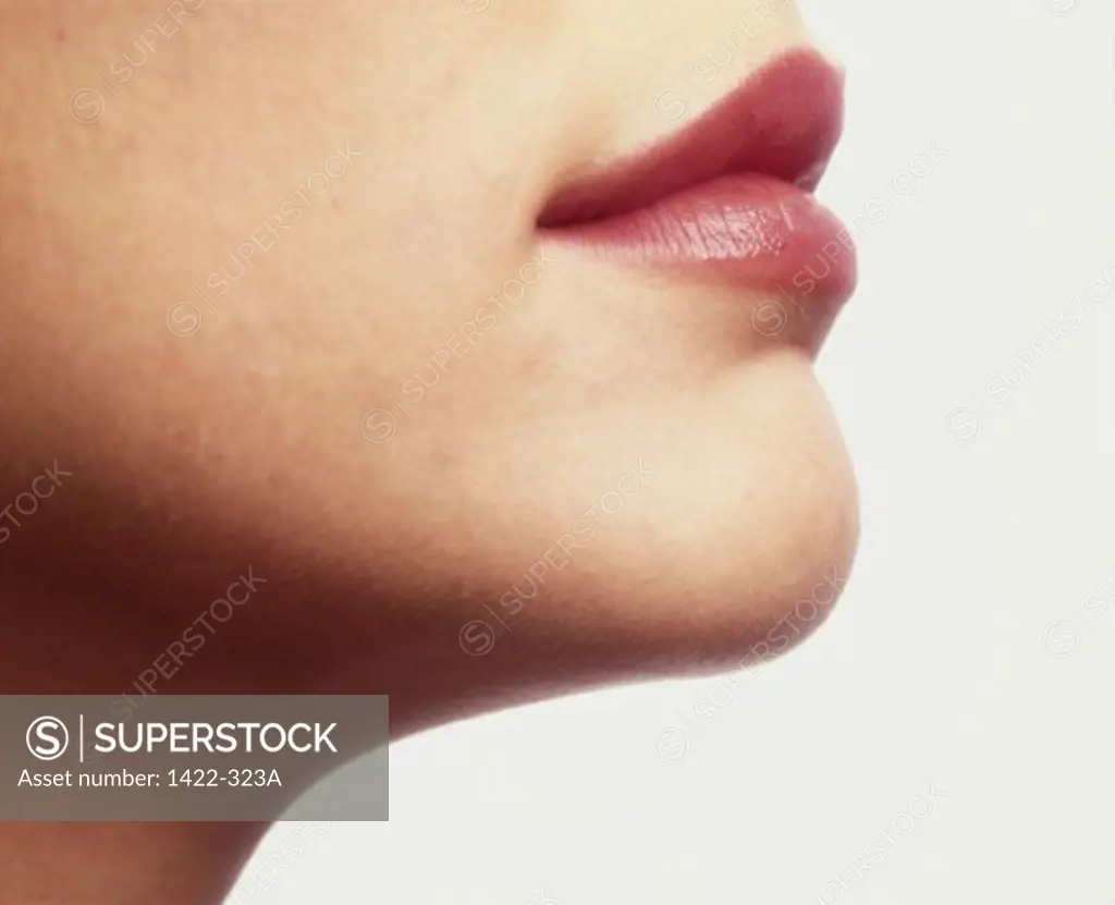Side profile of the lips of a young woman