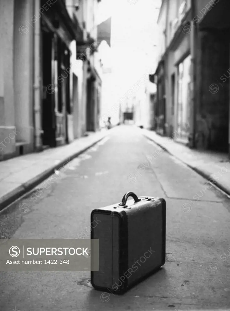 Close-up of a suitcase in a street