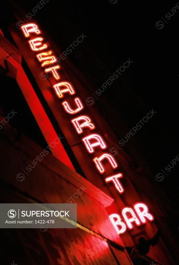 Low angle view of a neon sign of a restaurant