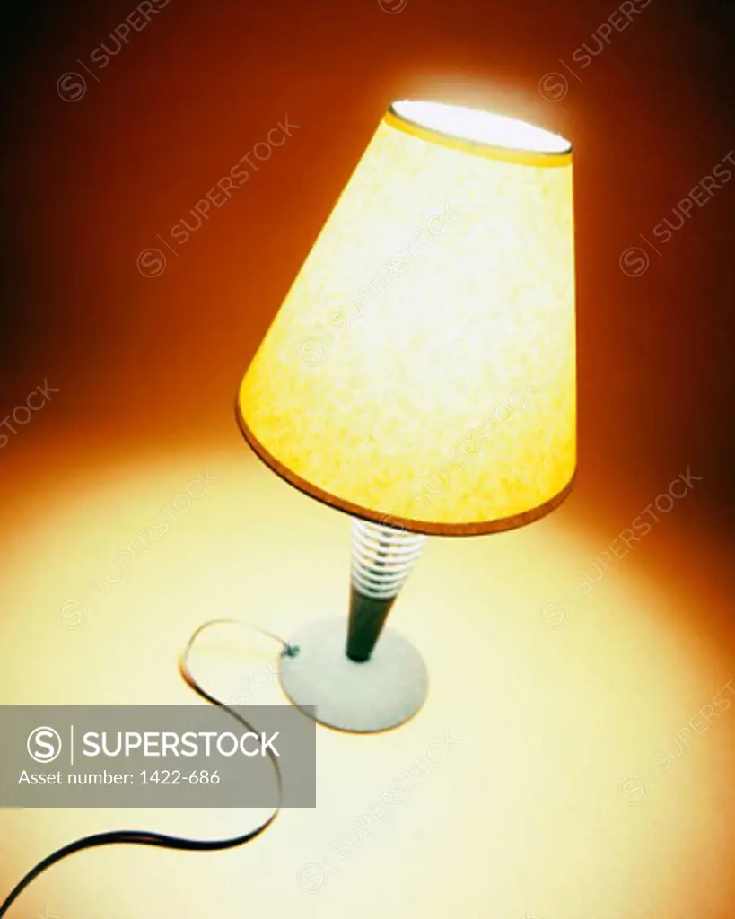 High angle view of a lit table lamp