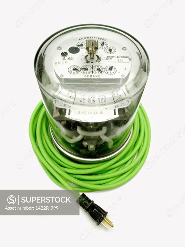 Electrical supply meter with a green electrical power cord and a black plug