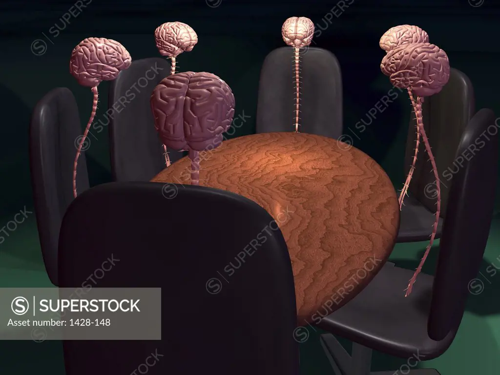 High angle view of human brains with spines in a conference room