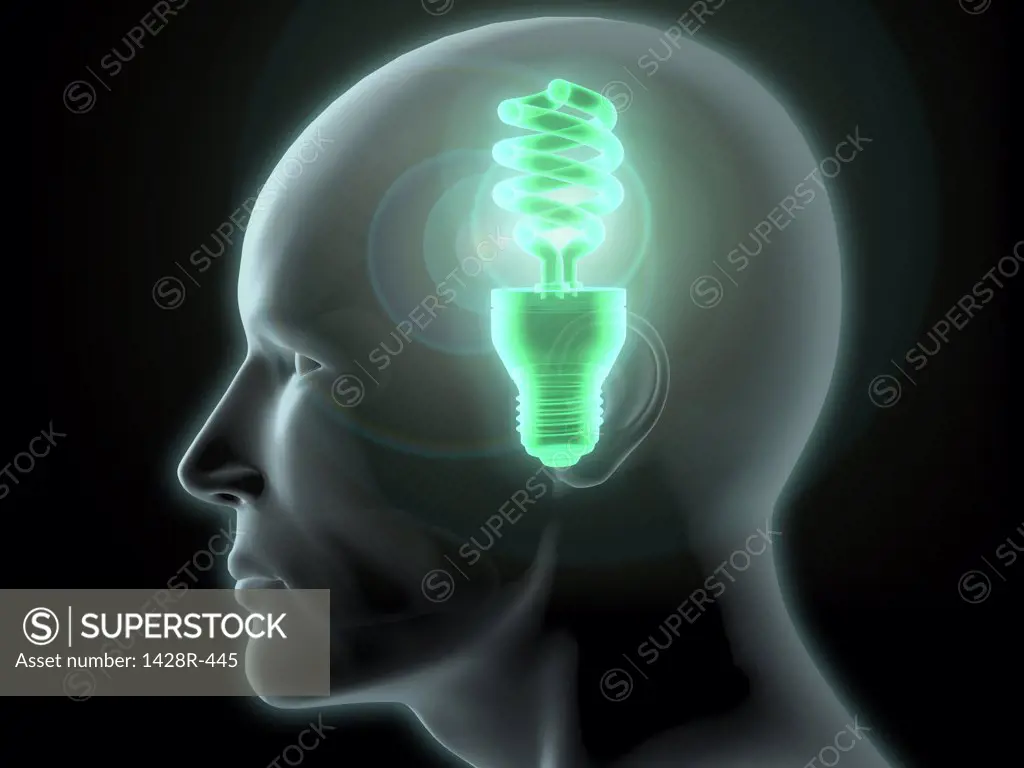 Close-up of a man's head with a glowing CFL green light bulb inside