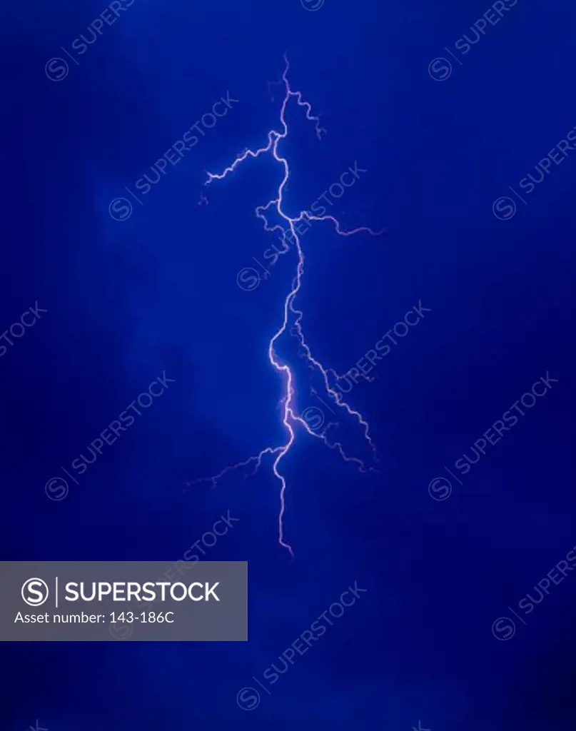 Low angle view of forked lightning in the sky