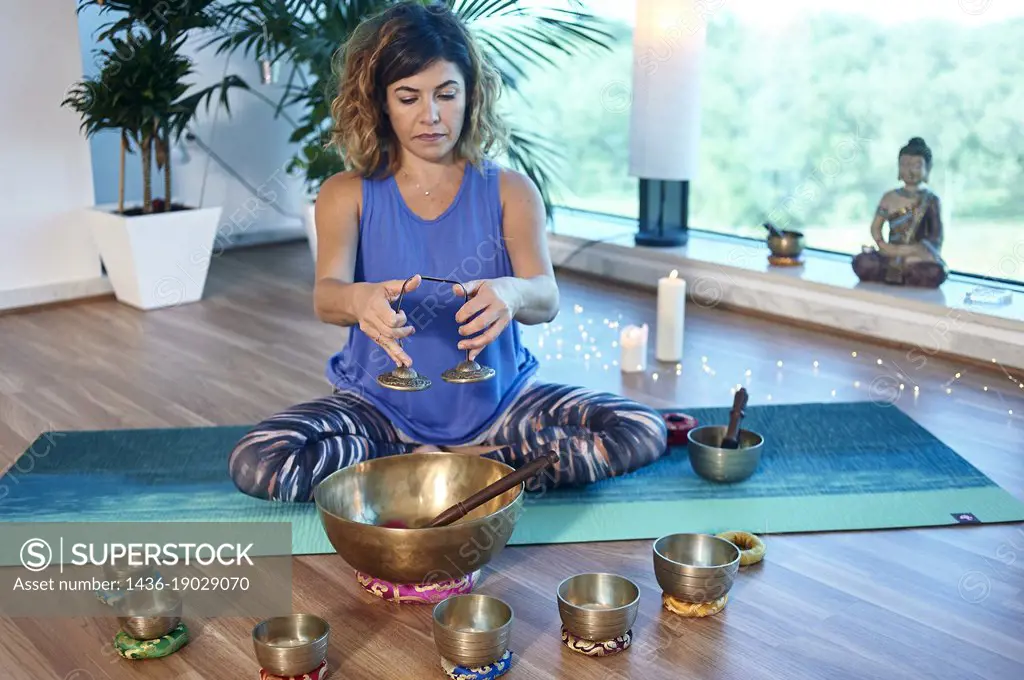 Yoga teacher practicing asanas and meditation