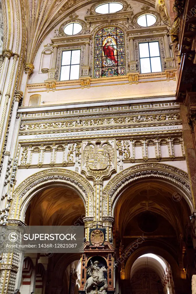Statue of Saint James the Moor Slayer under the risen Christ in the Cordoba Cathedral Mosque.
