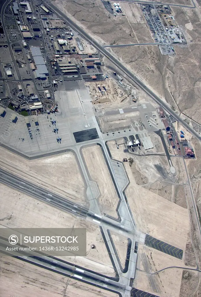NELLIS AIR FORCE BASE, NEVADA - MARCH 30: Aerial view of Nellis AFB with section of landing strip in view. Taken March 30, 2015 in Nellis AFB, Nevada.