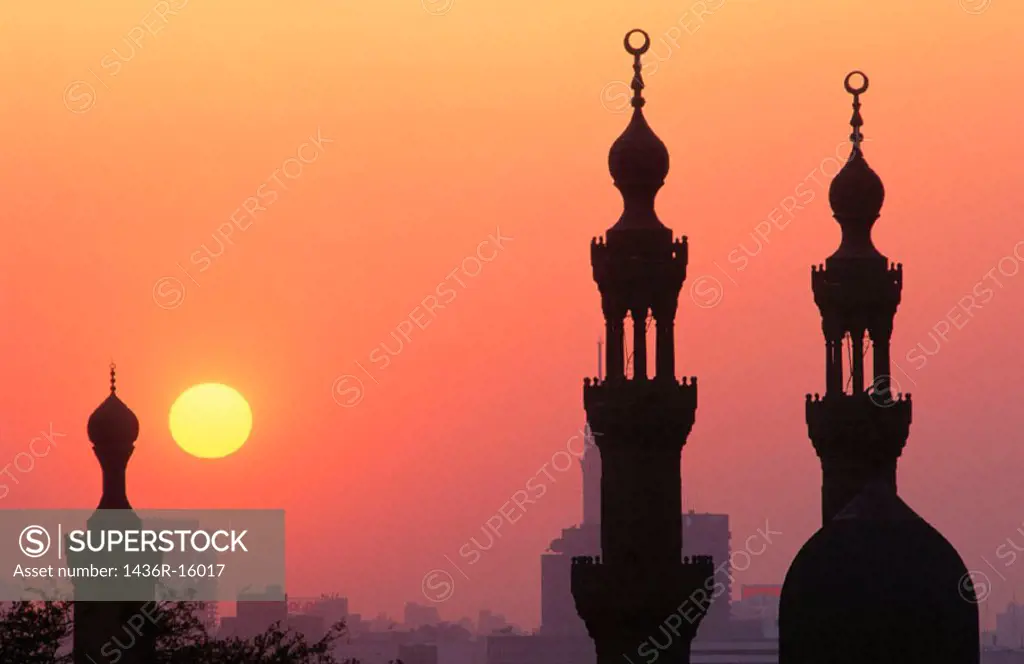 Sunset on Hassan Mosque minarets. Cairo. Egypt