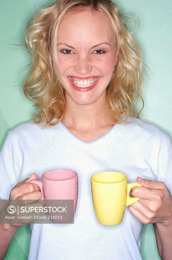 Woman holding cups